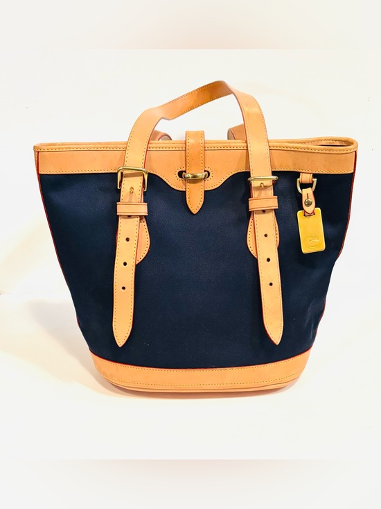 Dooney & Bourke Handbags - Dooney & Bourke Navy Canvas Cabriolet Bucket Bag Tote Tan Leather Trim